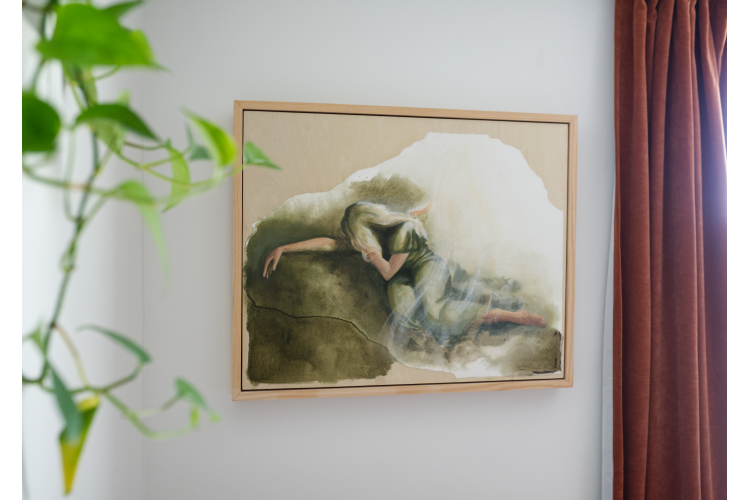 Colorful Display of framed artwork in greens, peaches and yellows