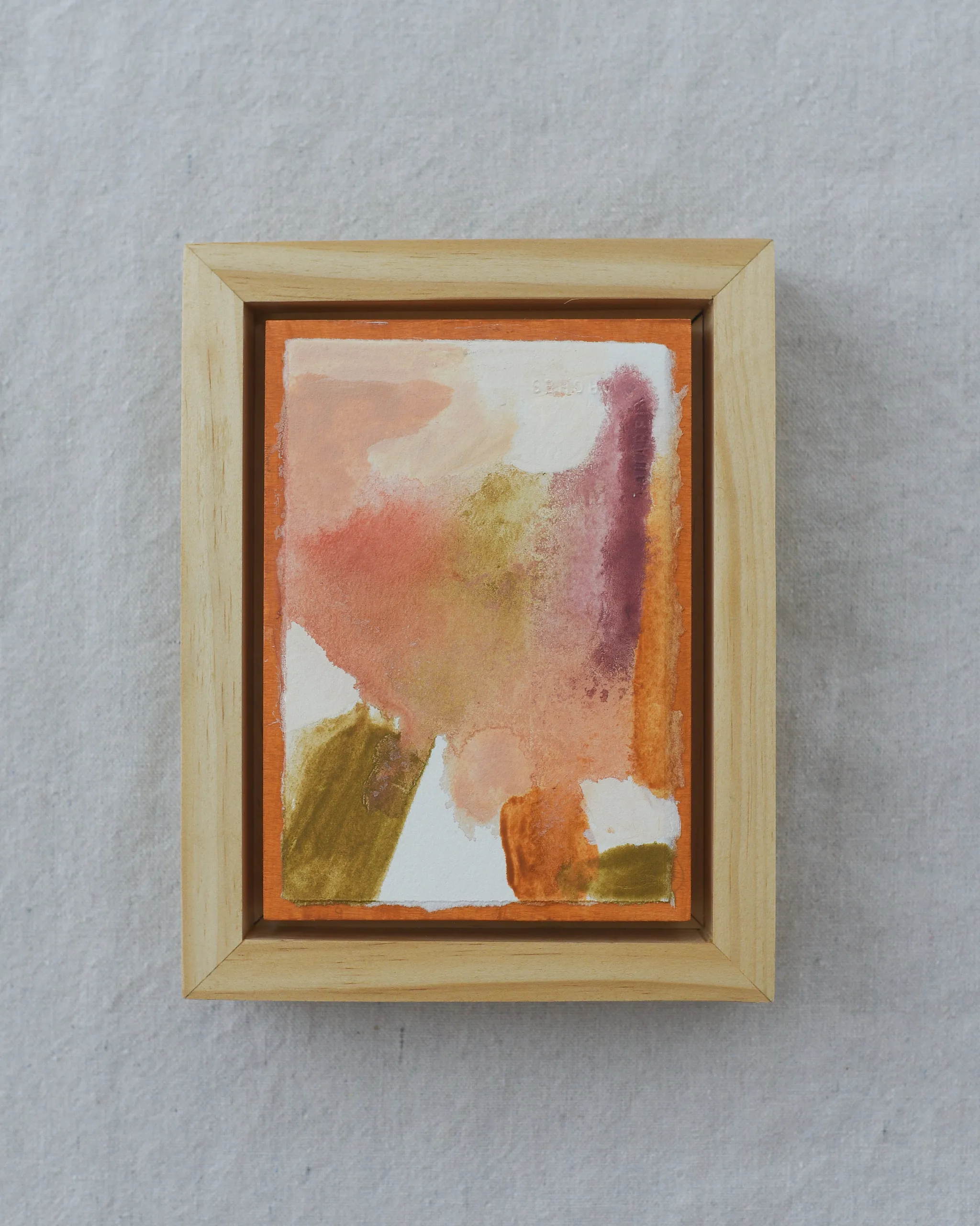 This intuitive abstract blends white, peach, soft pink, light olive green, and raw sienna, with a subtle hint of magenta.