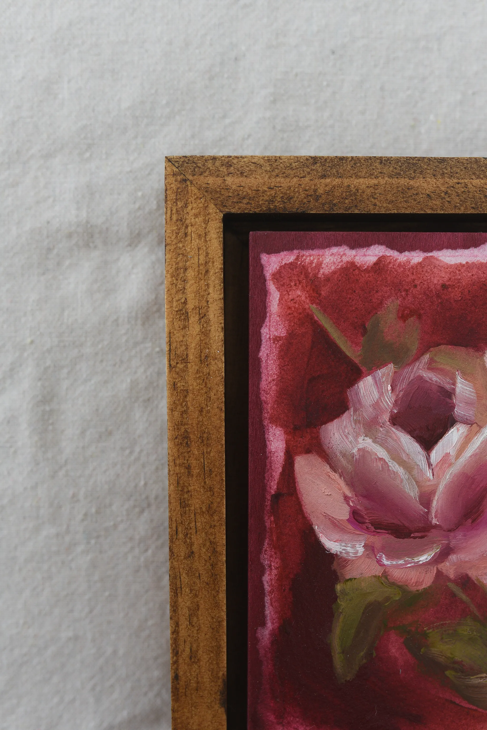Elegant Bloom, view 2 of 9: A rose blooms against a deep magenta background, rendered in acrylic and oil on paper.