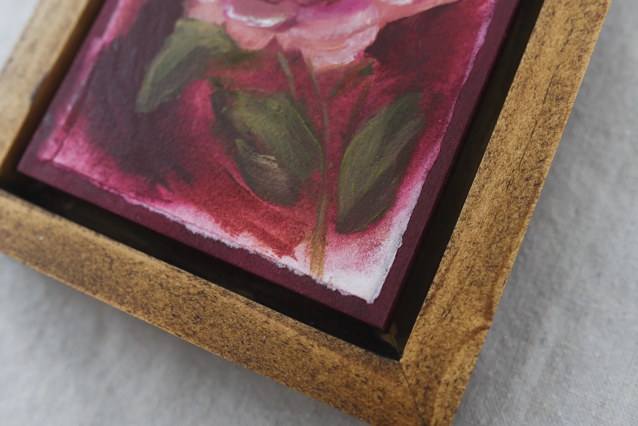 Elegant Bloom, view 7 of 9: A rose blooms against a deep magenta background, rendered in acrylic and oil on paper.