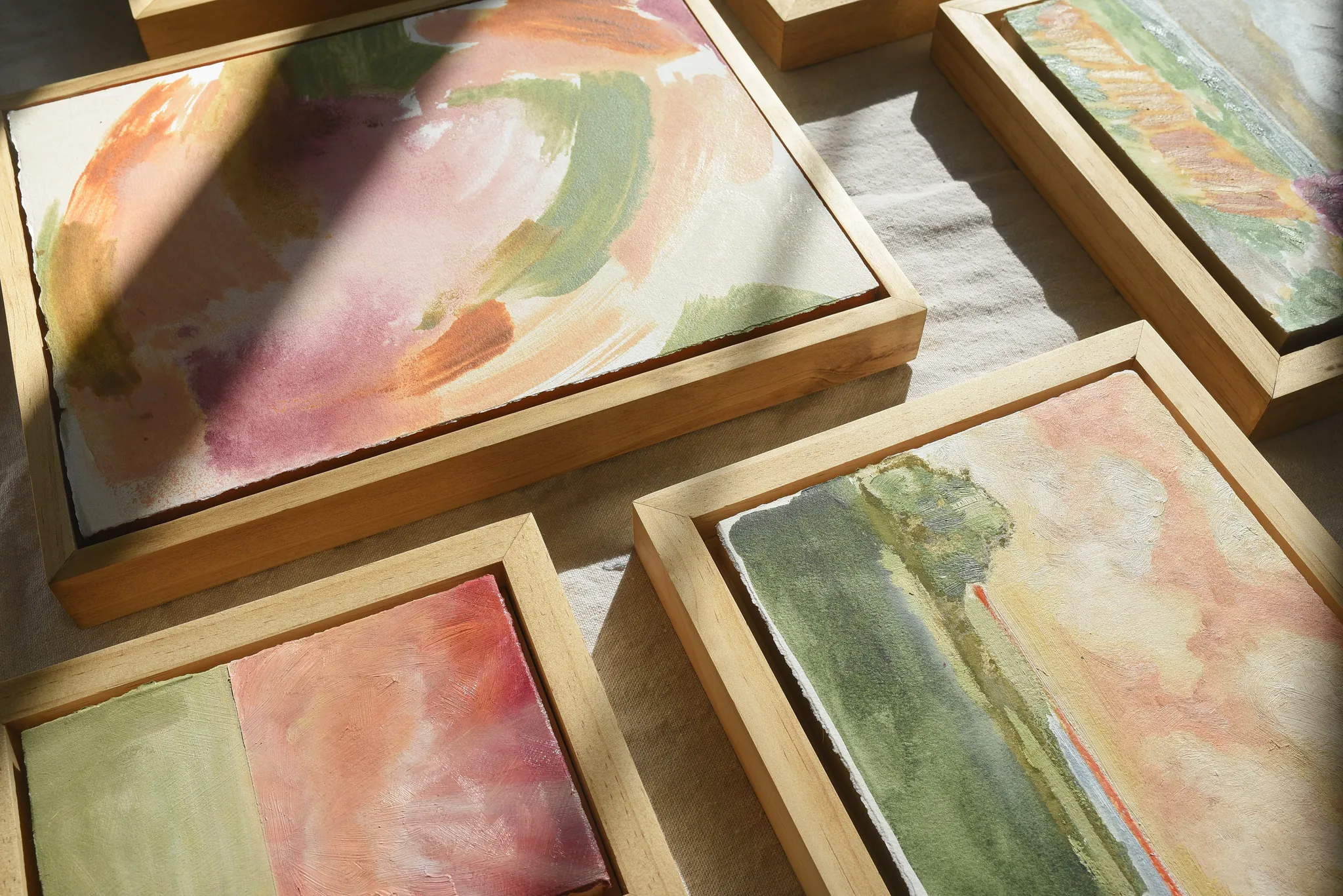 Hope horizon, view 5 of 10: **Hope Horizon** presents a vibrant landscape where warm, puffy clouds painted in soft peaches and radiant yellows dance across the sky, casting a.