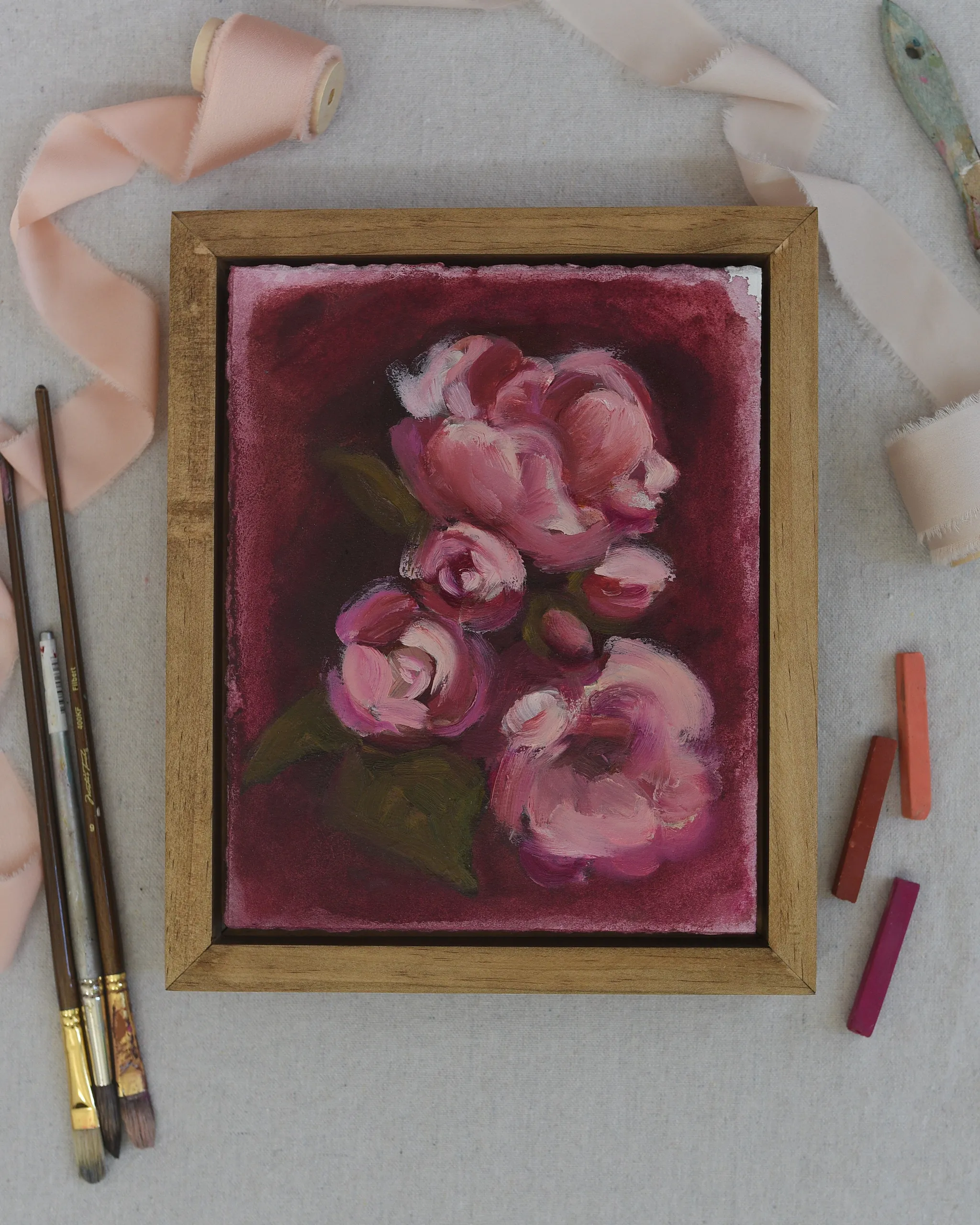 Radiant Bloom, view 2 of 6: light pink flowers dance across a deep magenta background, their soft petals contrasted by the vibrant warmth of the scene.
