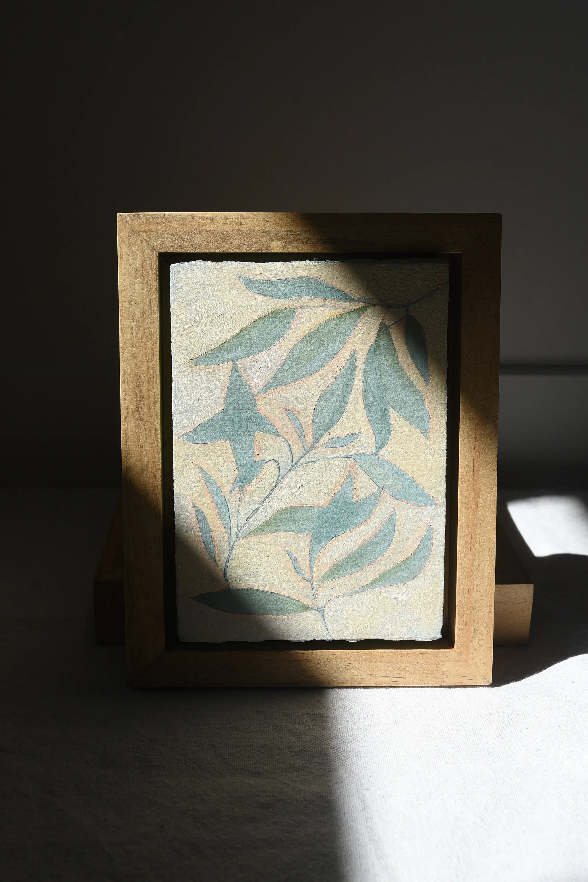 Refreshing Bloom, view 3 of 12: mint-colored leaves gently resting on a creamy vanilla background, with subtle hints of peach.