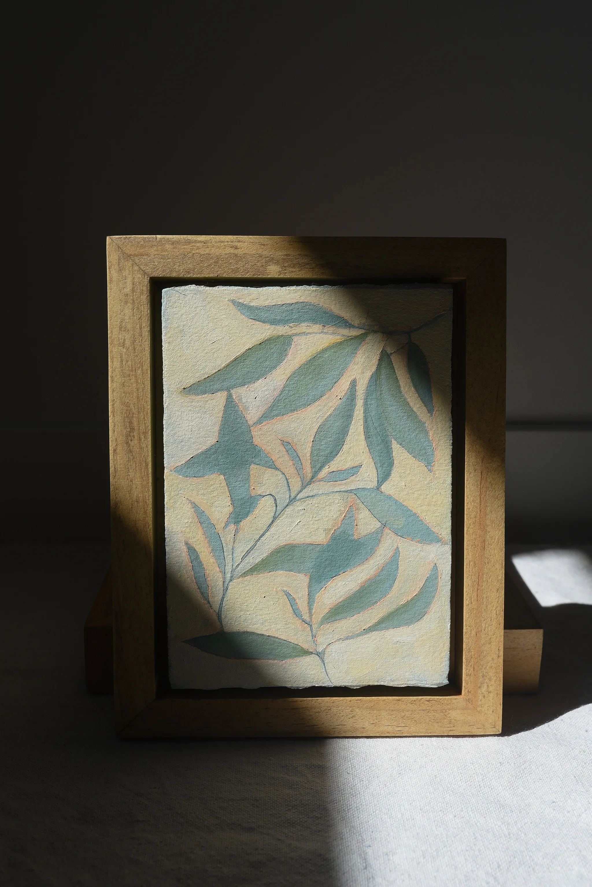 Refreshing Bloom, view 4 of 12: mint-colored leaves gently resting on a creamy vanilla background, with subtle hints of peach.