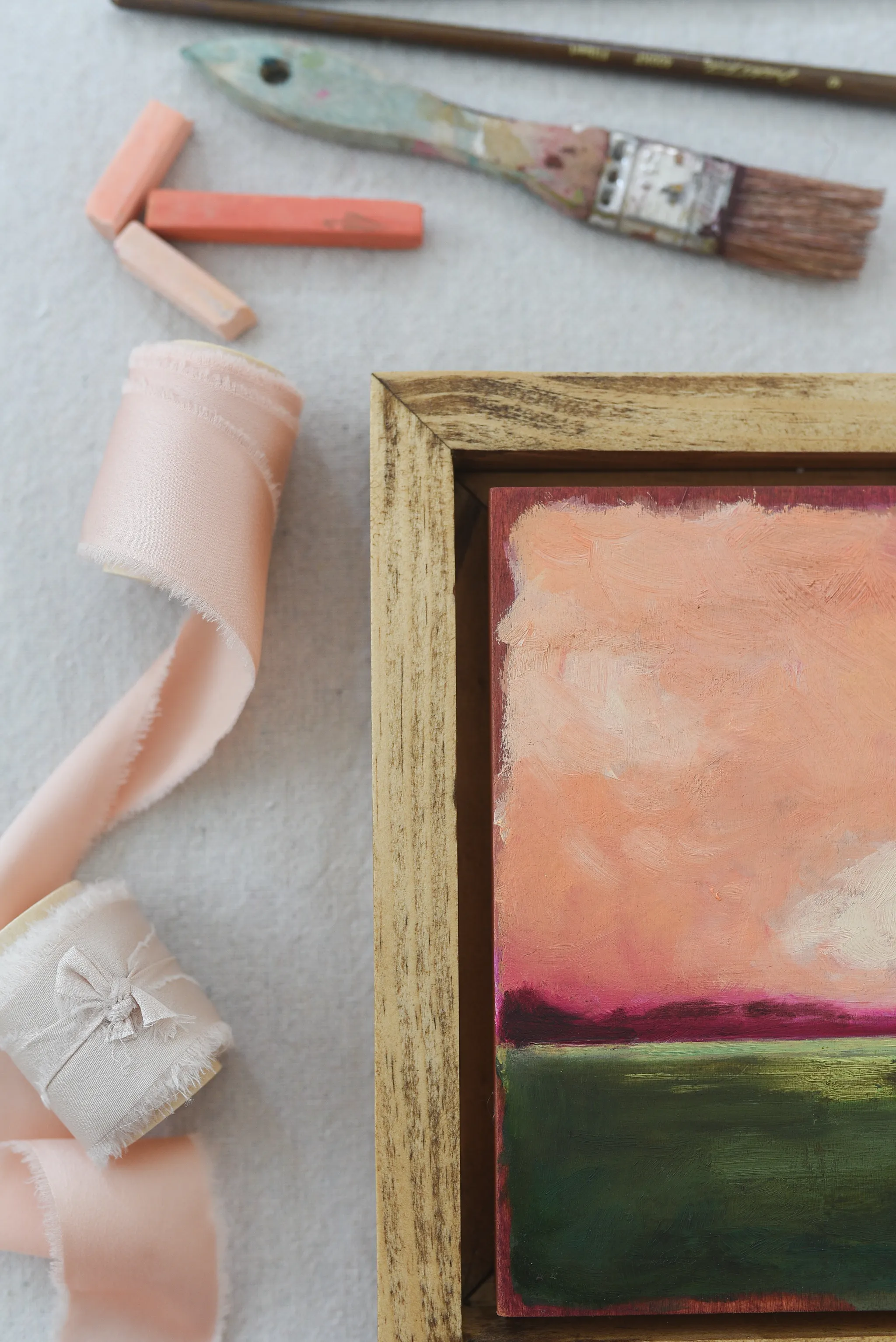 Reverie, view 4 of 12: A striking peach and deep magenta sky adorned with soft clouds, set against a backdrop of deep lush green.