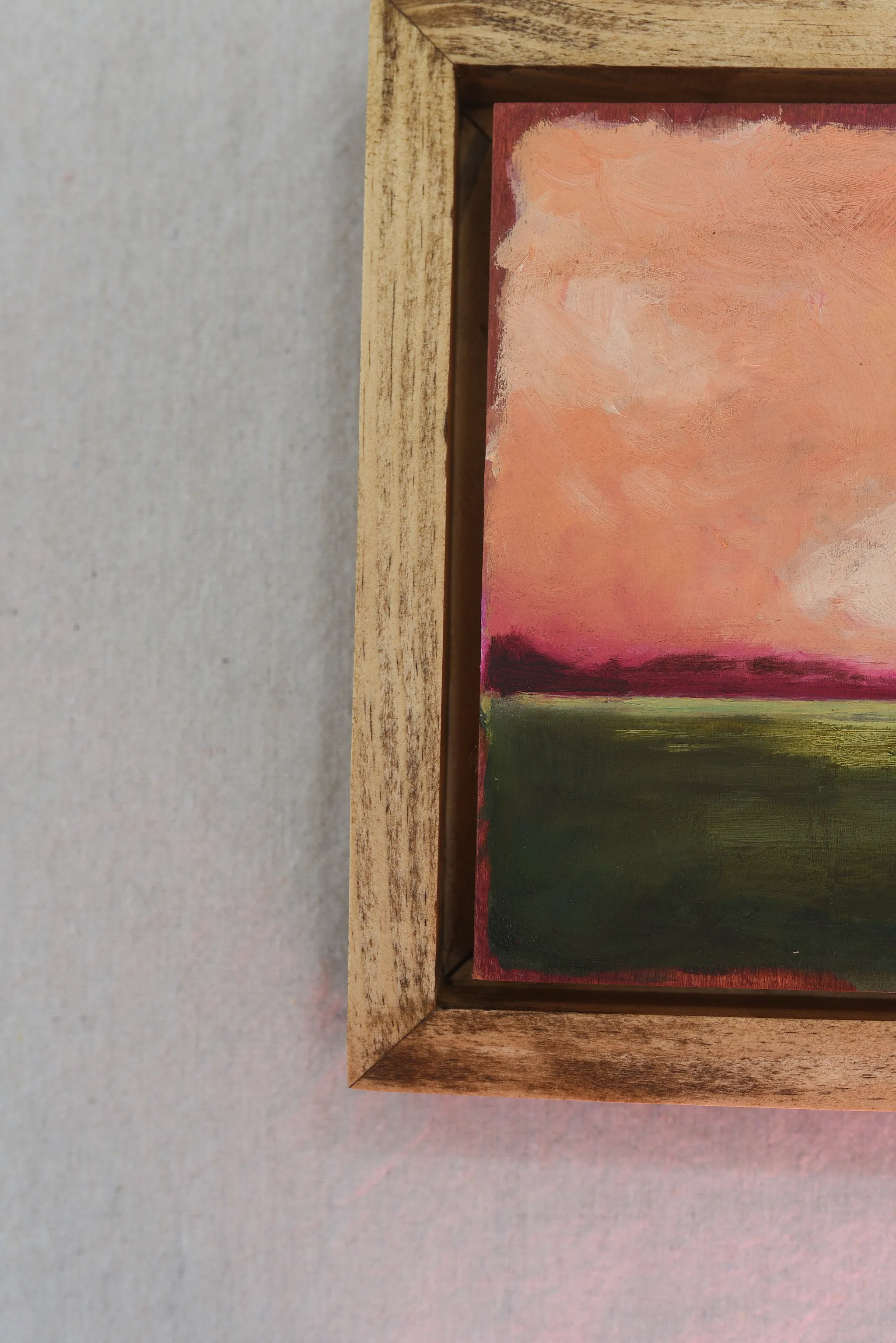 Reverie, view 7 of 12: A striking peach and deep magenta sky adorned with soft clouds, set against a backdrop of deep lush green.