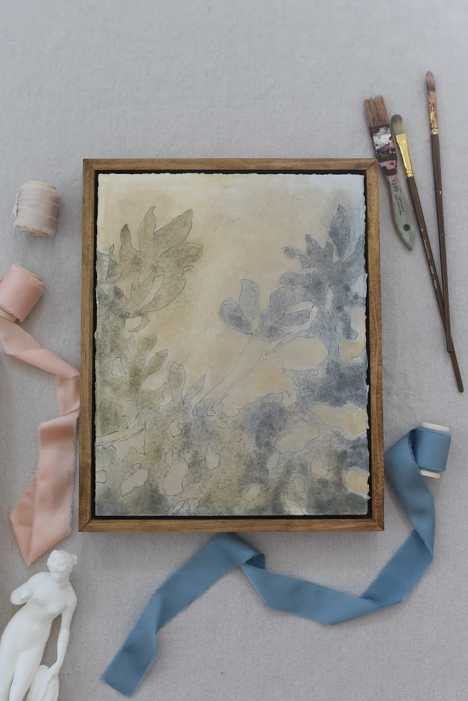 Shapes of Shadows" invites you into a serene interplay of light and form, where deep French blue and teal dance across a warm sandy backdrop.
