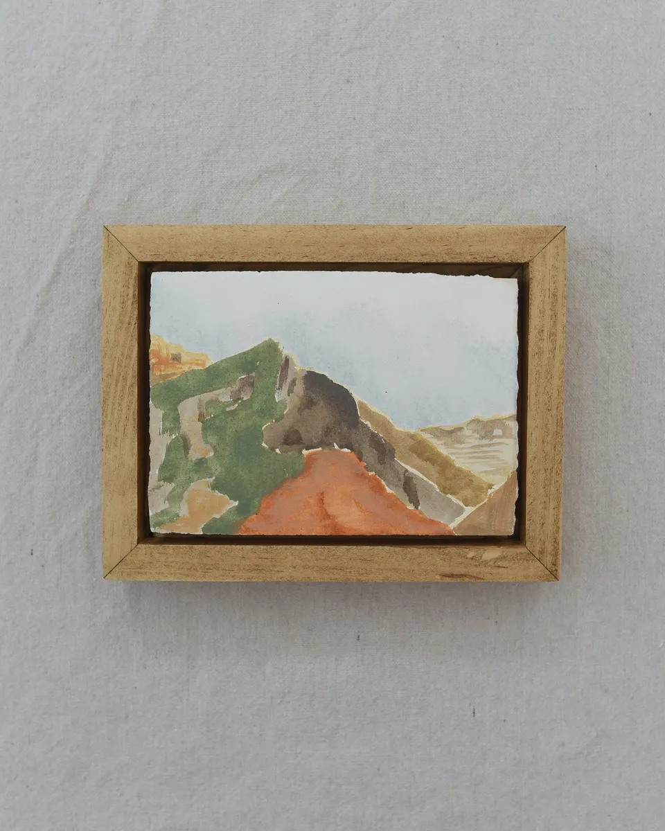 Sunlit Rocks, an original painting of red rock country in a raw wood frame.