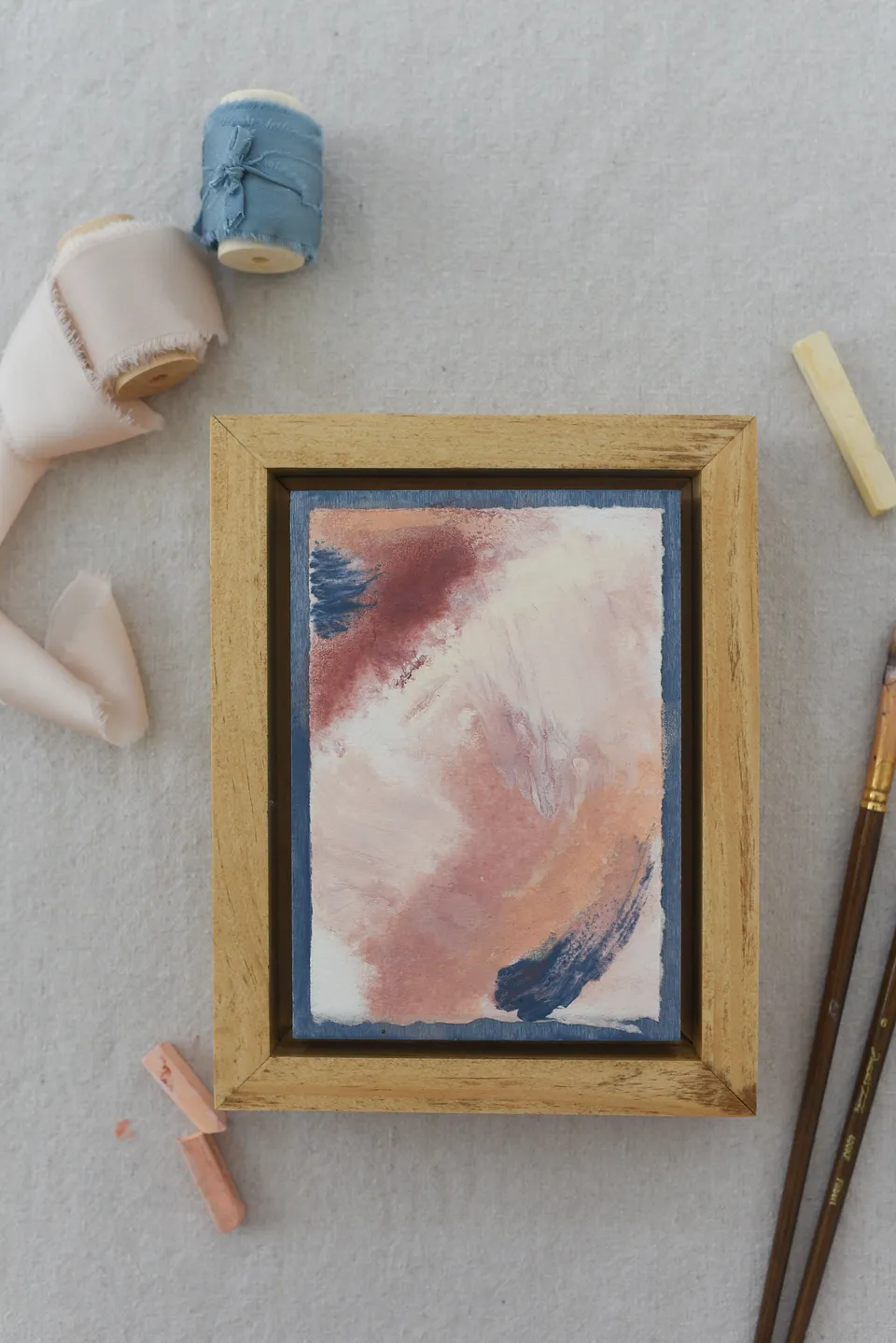 A soothing palette of French blue, soft pink, and creamy white, creating a gentle and heavenly atmosphere.