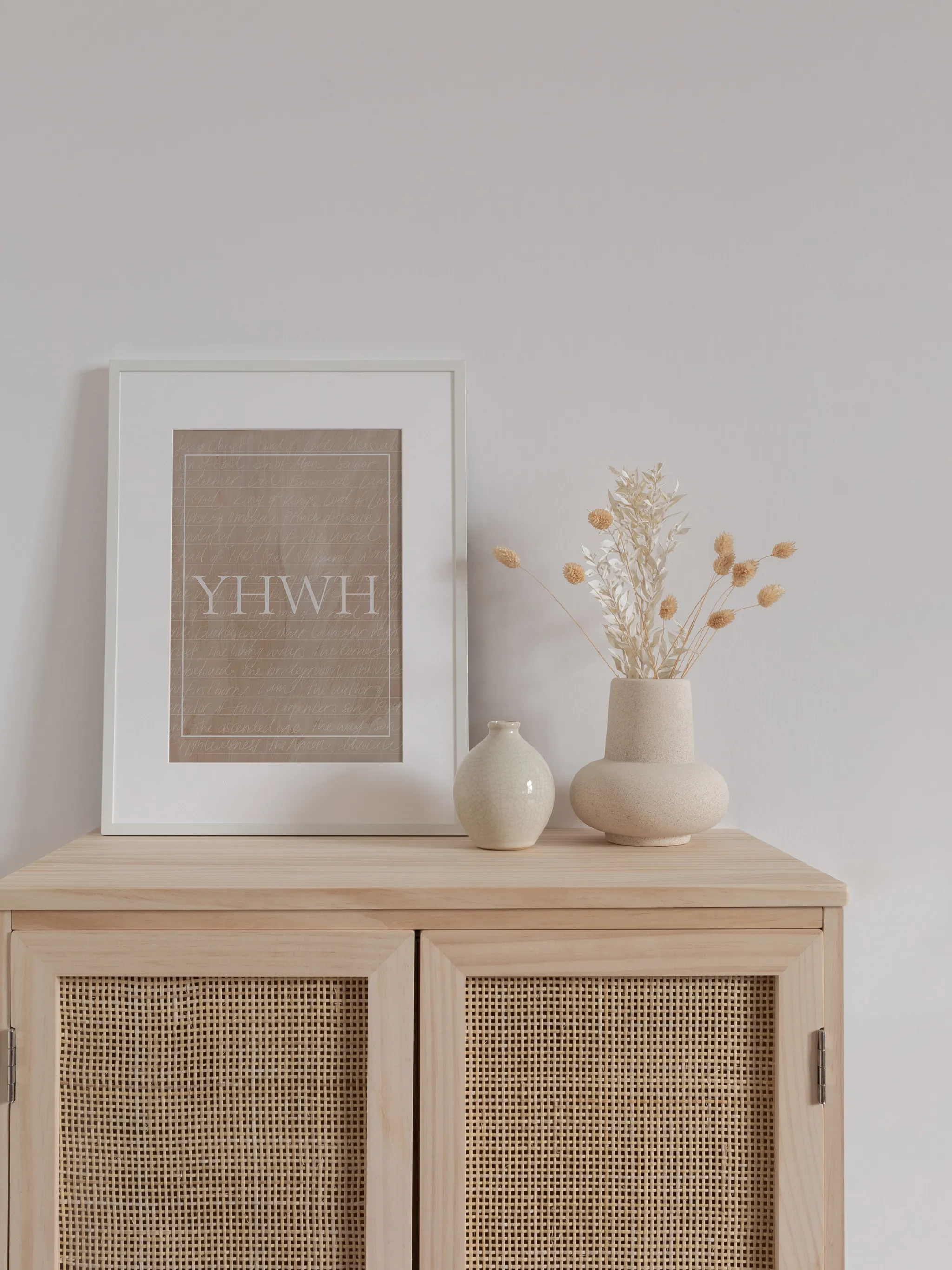 YHWH, shown as a print.