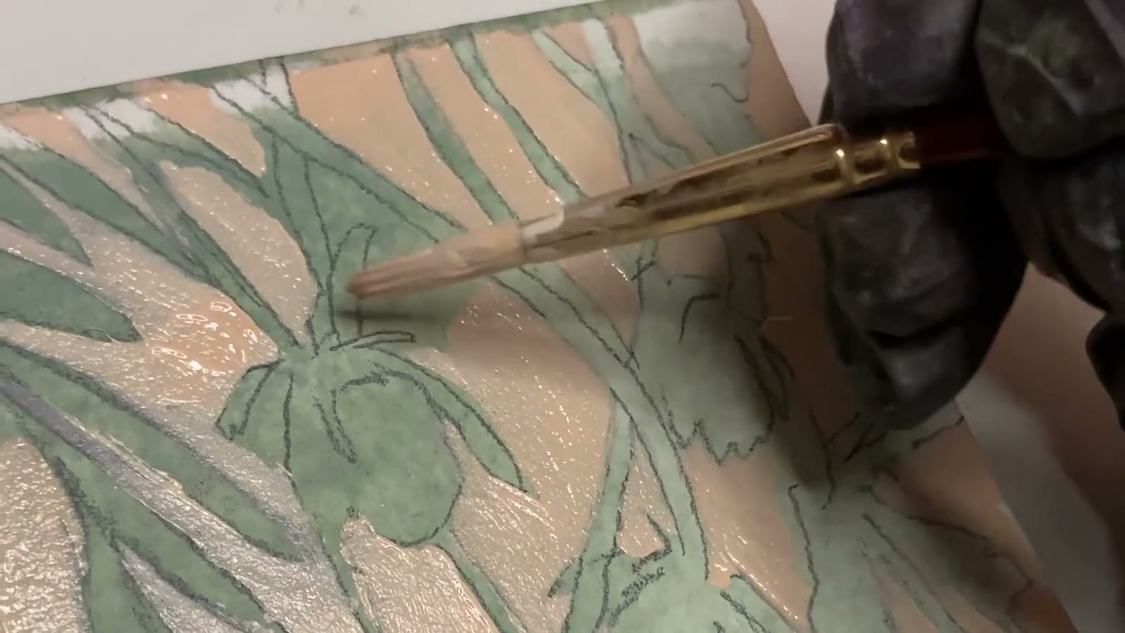 McKenna's brush working sage leaves into the sunflower painting.